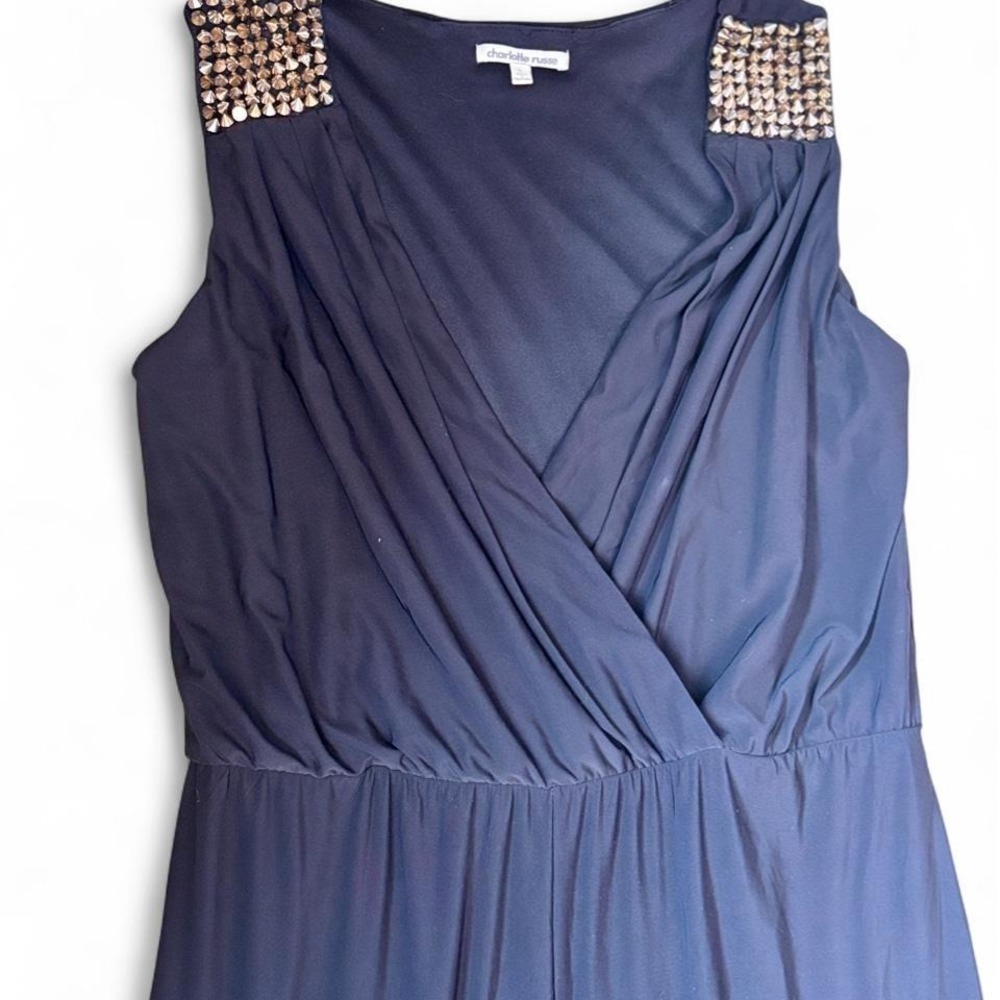 Charlotte Russe black jumpsuit with gold spike stud‎ embellishments. Size L
